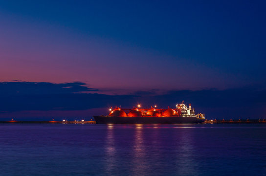 LNG TANKER - Ship at dawn moored to the gas terminal
