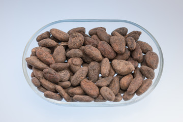 cocoa beans in a glass bowl