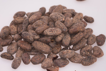 pile of Cocoa beans on white background
