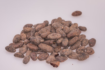 pile of Cocoa beans on white background
