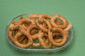 Pretzels crackers  with with olives and wine 