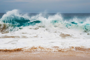 Fototapeta premium Waves on the beach of the Pacific Ocean. Todos Santos.