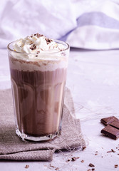 hot chocolate with cream, powdered sugar and berries