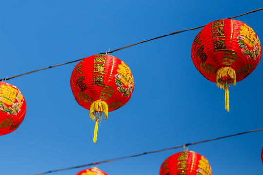 Chinese new year lanterns on blue sky background in china town