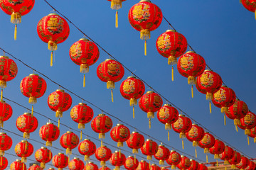 Chinese new year lanterns on blue sky background in china town
