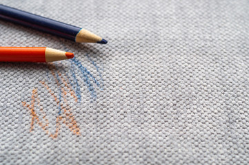 Drawn fabric on the couch with colored pencils. Furniture fabric. Cleaning concept