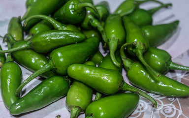 Green peppers on display at the market