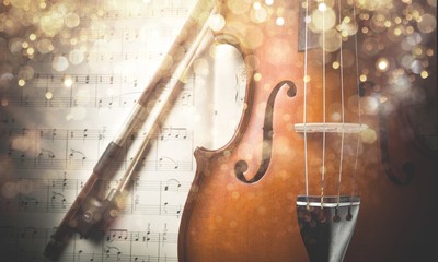 Obraz na płótnie Canvas Photo Of Violin And Musical Notes