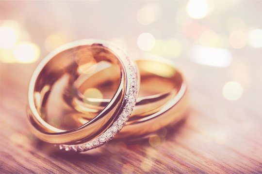 Engagement rings on background