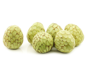 fresh cherimoya fruits (Annona cherimola) on a white background