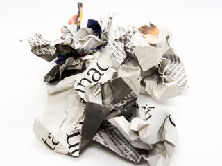 torn and crumpled newspaper