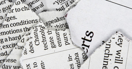 torn and crumpled newspaper