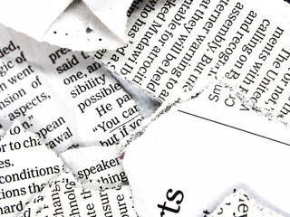 torn and crumpled newspaper