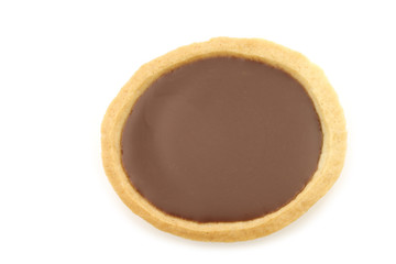 caramel and chocolate filled cake on a white background