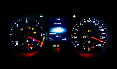 Modern light car mileage on black background