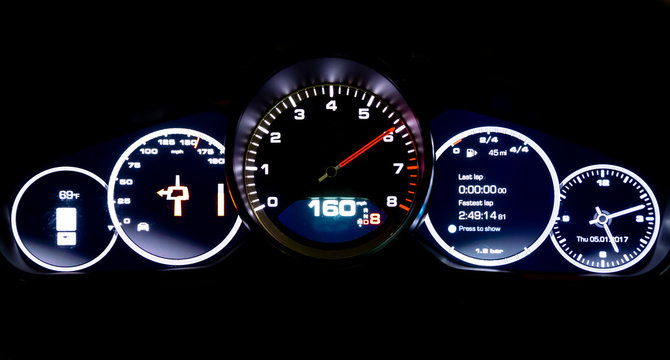 Modern light car mileage on black background