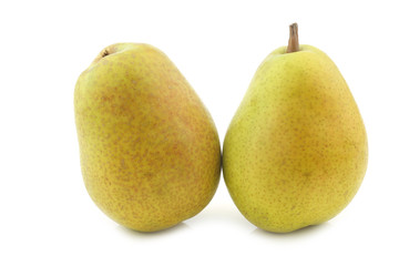 two fresh Lucas pears on a white background