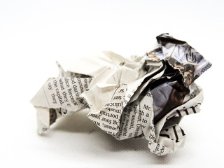 torn and crumpled newspaper
