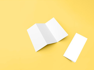 Tri-fold brochure mockup isolated on yellow background