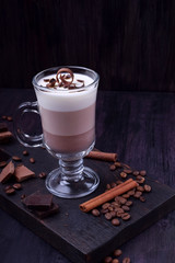 Layered dessert in an Irish glass mug with coffee and chocolate
