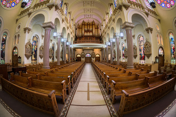 Fototapeta na wymiar Fisheye perspective of the pipe organ in the rear of the Sacred Heart Catholic Church in downtown Tampa, Florida