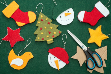 Making of handmade christmas toys from felt