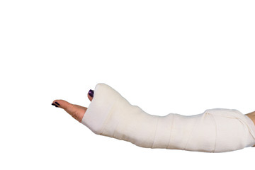 Woman broken arm bone in cast, plastered hand on white isolated background.
