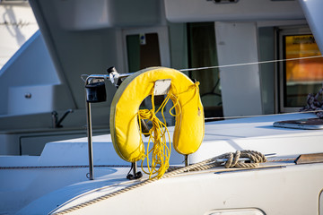 Saint Vincent and the Grenadines, Sailboat with yellow horseshoe personal flotation device 