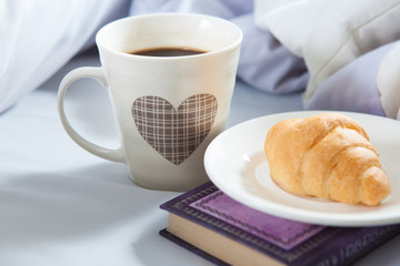Bedroom on the bed, morning coffee. Happiness. A heart.
