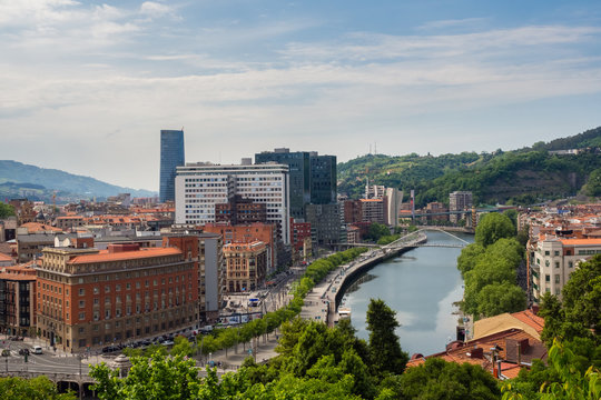 Views of the Abandoibarra promenade next to the river in Bilbao