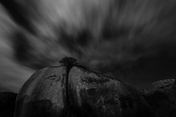 Night landscape with moonlight in the Barruecos Natural Area. Extremadura. Spain.