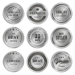 set of silver badges and labels