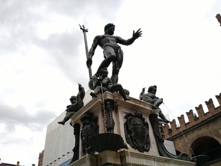 Fototapeta na wymiar The Fountain of Neptune at Piazza del Nettuno, Bologna, Italy