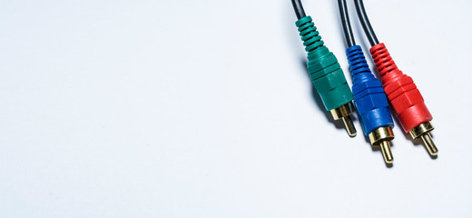 Multimedia multi-colored cables. Or tulips adapters for audiodevices. On a white background. The...