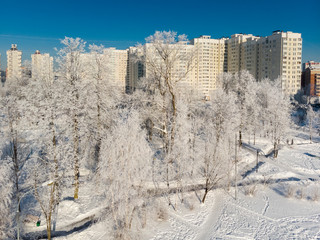 View of snow-covered city park on sunny day. Moscow, Russia