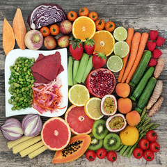 Healthy diet food concept with a large selection of fruit, vegetables, meat and spice. Health foods high in protein, anthocaynins, dietary fibre, vitamins and anthocaynins. Top view. 