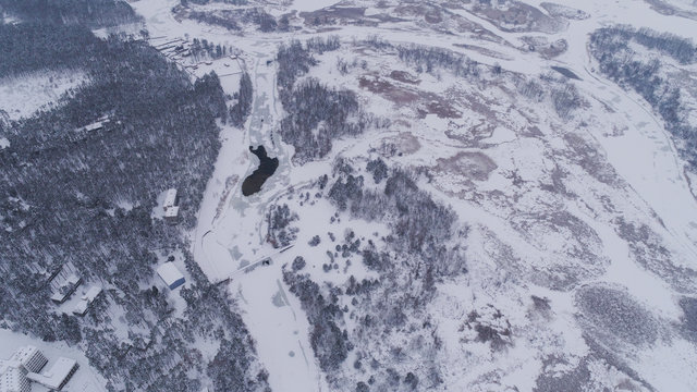 Frozen river and forest in snow view Fromm 500 meter , drone shoot ,areal photo 