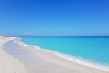 Awesome beach of Varadero during a sunny day, fine white sand and turquoise and green Caribbean sea,Cuba.Hrizontal photo,copy space.