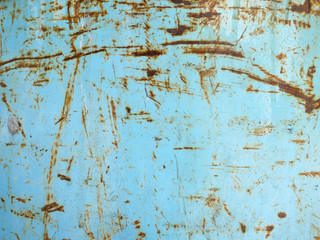 Background rust stains on metal plates.