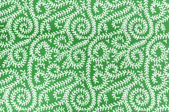 Background with white squiggle design on green