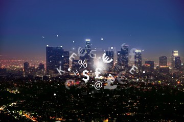 Technological currency exchange icons over night city skyline