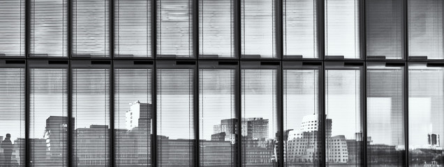 Duesseldorf, GERMANY - January 20, 2019: Skyline of new Media Harbour reflects in the glas fron of office building