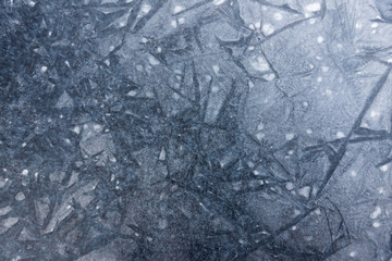 Background of cracked blue shining ice - perfect use for portrait or other purposes - high resolution