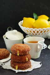 Donuts with cinnamon and lemon cream. Homemade baking. Selective focus.