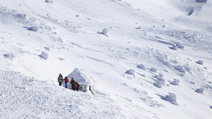 Fototapeta na wymiar alpenis goes to the top of the mountain