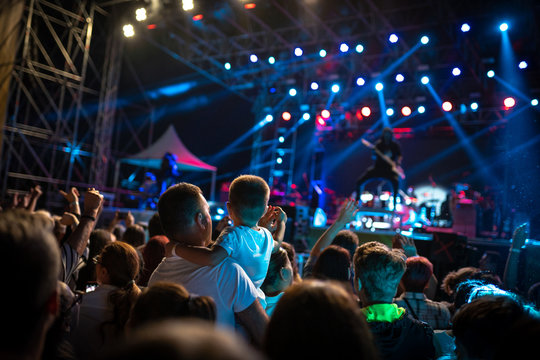 Crowded concert for adults and children alike