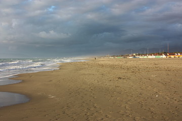 romantic and dreamy panorama of the sea of ​​versilia in tuscany. a peaceful day despite the cold of winter. rest and relaxation