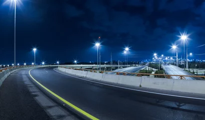 Raamstickers Empty freeway at night © Dmitry Pistrov