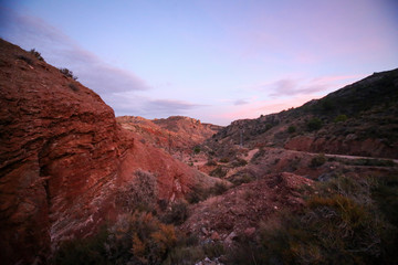 red rocks canyon with red and blue sunset 