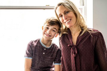 A people and family happy boy with mother at home